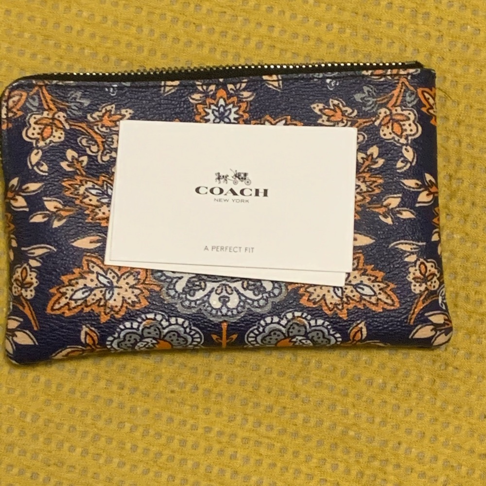 Coach wristlet (wrist/zipper pull is missing)